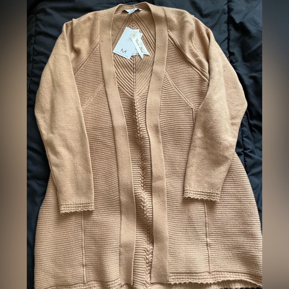 Long cardigan (never warn)